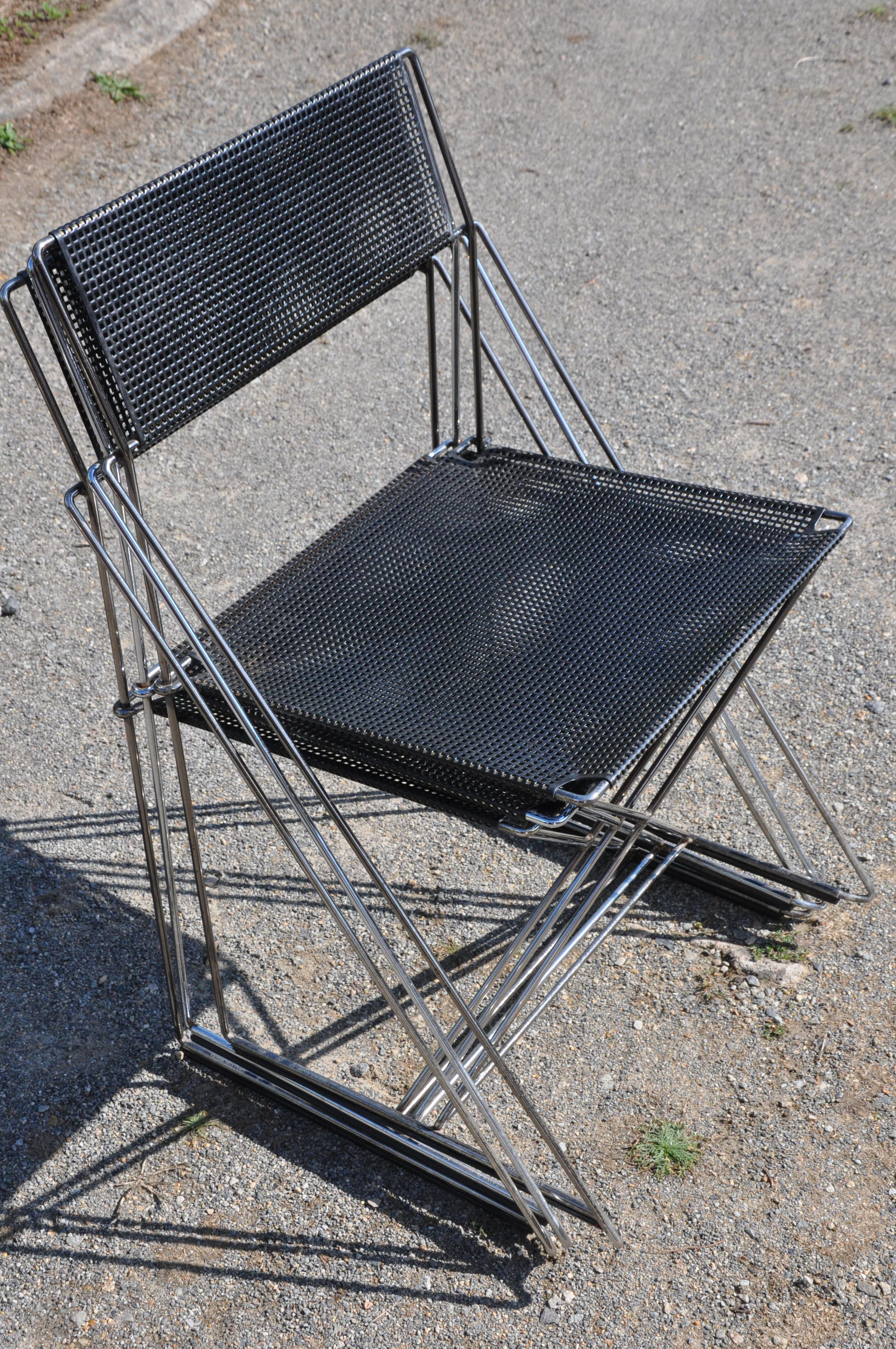 Nuova x line omli chairs by Niels Jørgen Haugesen