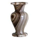 Natural stone vase with marbled patterns.