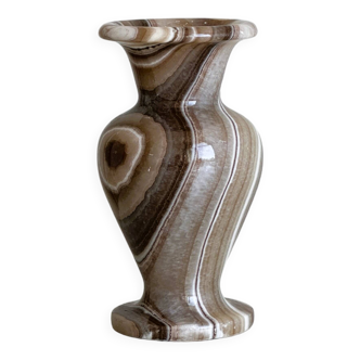 Natural stone vase with marbled patterns.