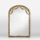 Large baroque decorated chimney mirror in gilted wood, France ca. 1800