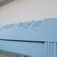 Parisian Art Deco armoire with beveled mirror and painted decoration
