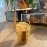 Vichy curist glass graduated in his leather and straw bag