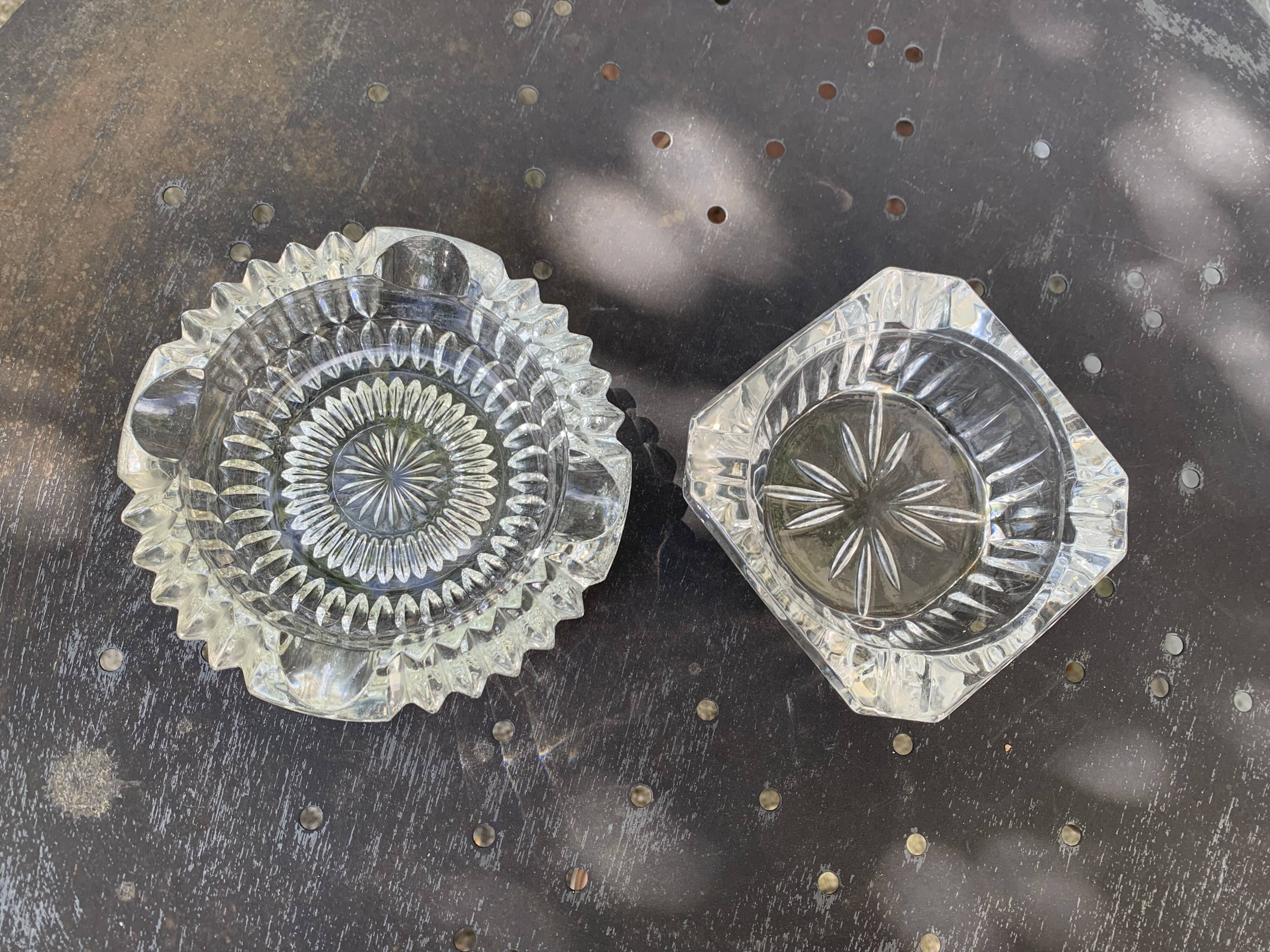Set of two elegant vintage transparent glass and crystal ashtrays