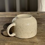 Set of 4 vintage speckled beige stoneware coffee cups.