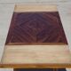 Antique solid walnut table with marquetry and extensions.