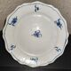 Old plate in Northern earthenware with blue floral decoration eighteenth century