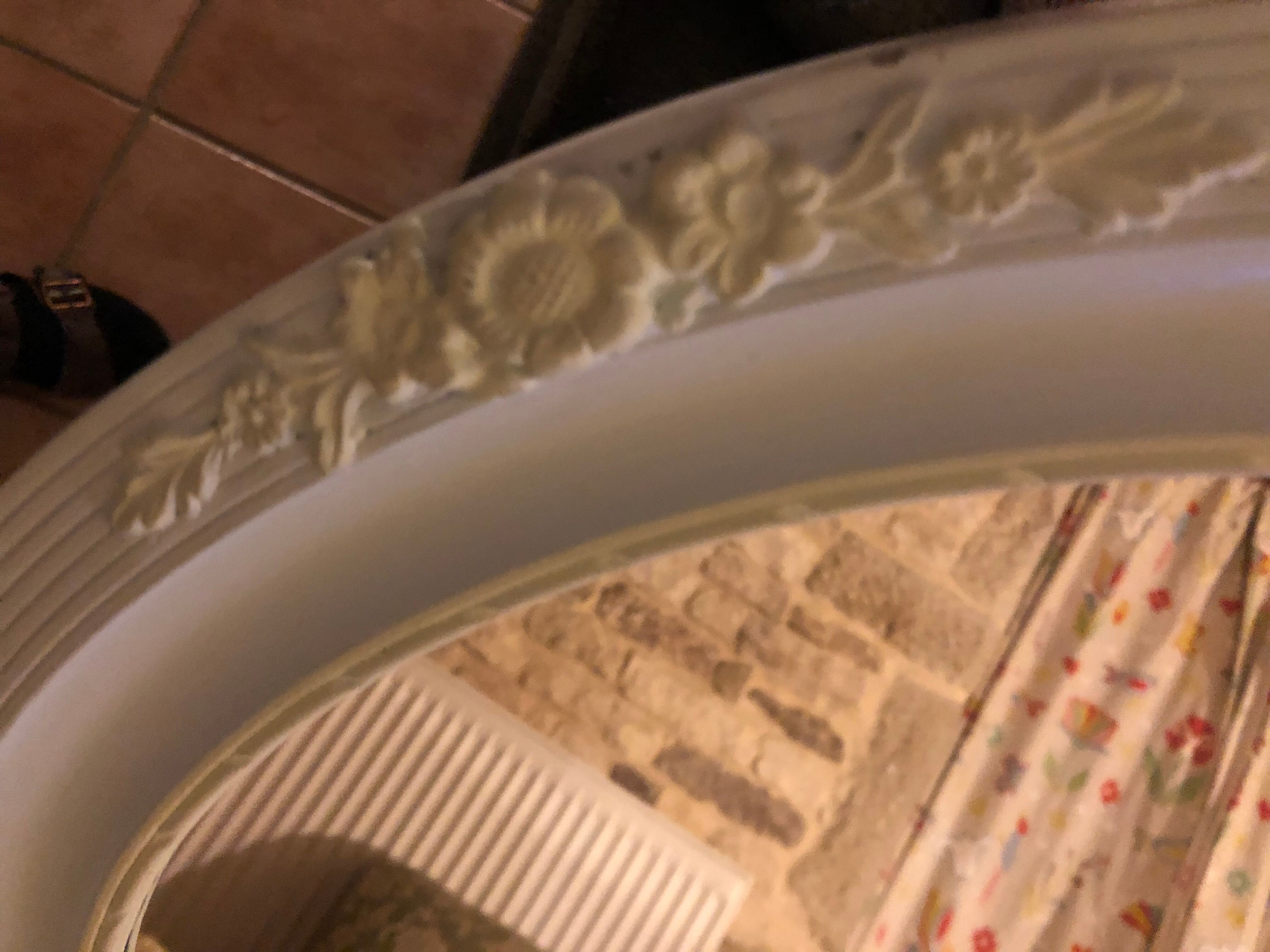 Mirror in carved wood