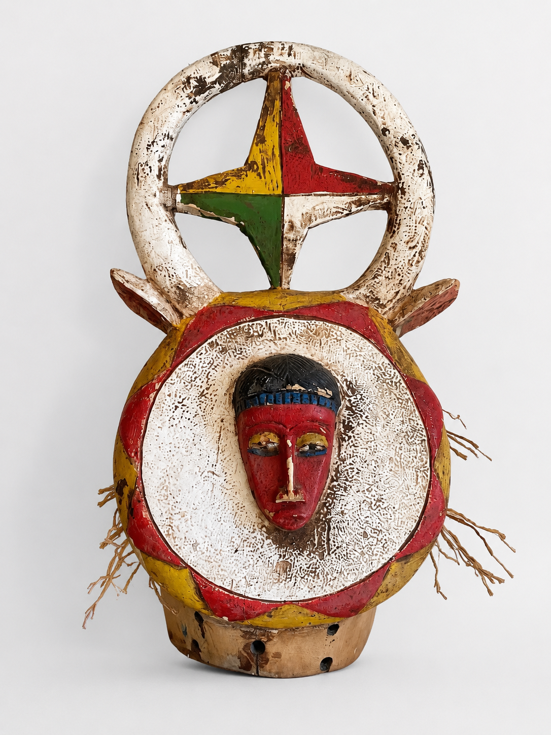 Polychrome carved wooden African mask