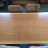 Dining table with compass feet