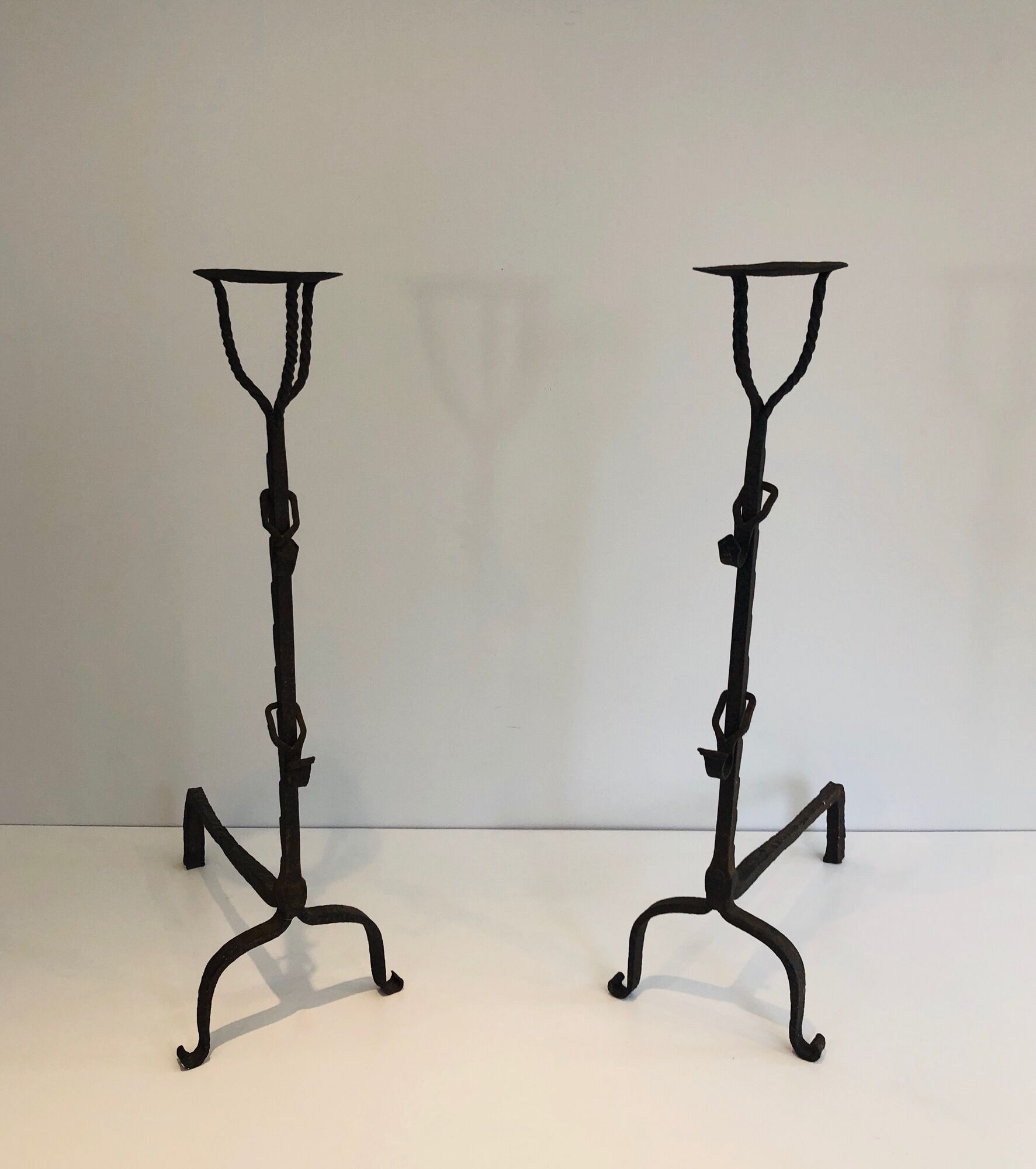 Pair of wrought iron landiers. french work ,seventeenth century