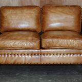 Two-seater leather canapé, hand-tanned, Edwardian style with studs.
