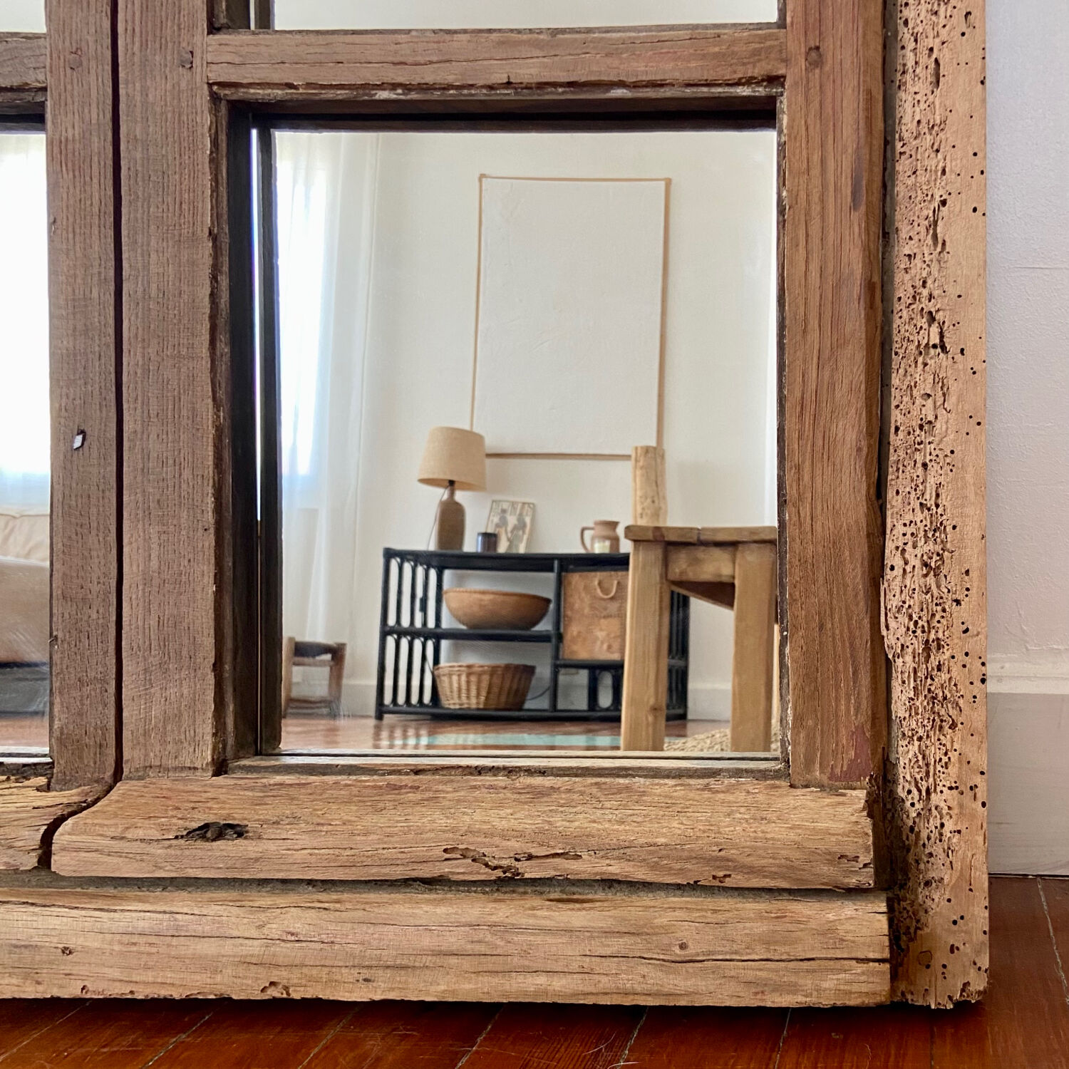Mirror in old rustic window