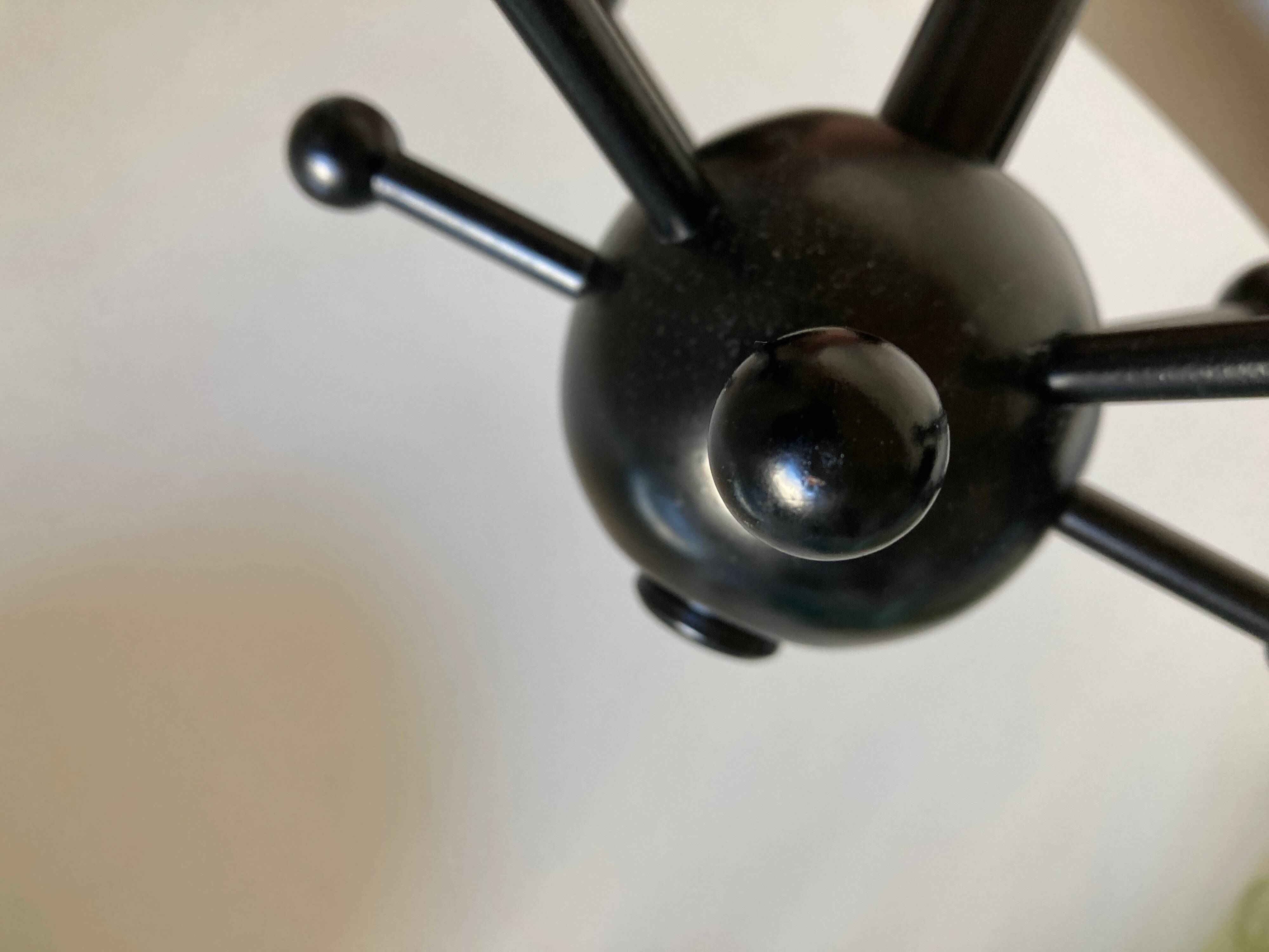 Pair of black space age sputnik coat racks
