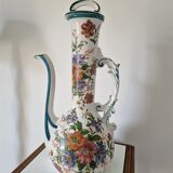 Old jug in flowered porcelain