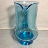 Old blue blown glass pitcher with vintage handle