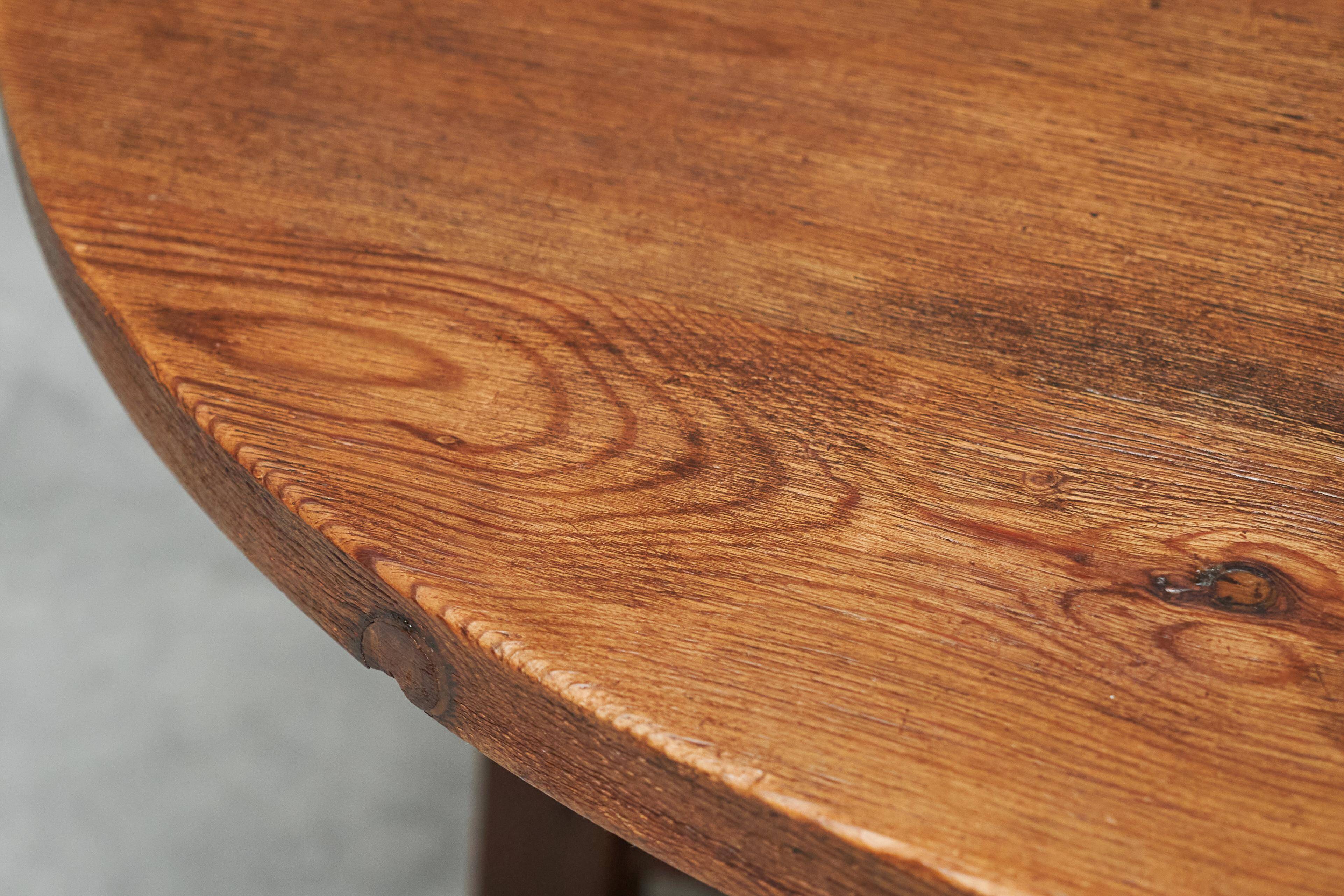 Dining table or Spanish centre table in solid wood and wrought iron from the mid-20th century.