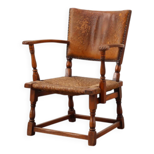 Fauteuil en cuir et chêne