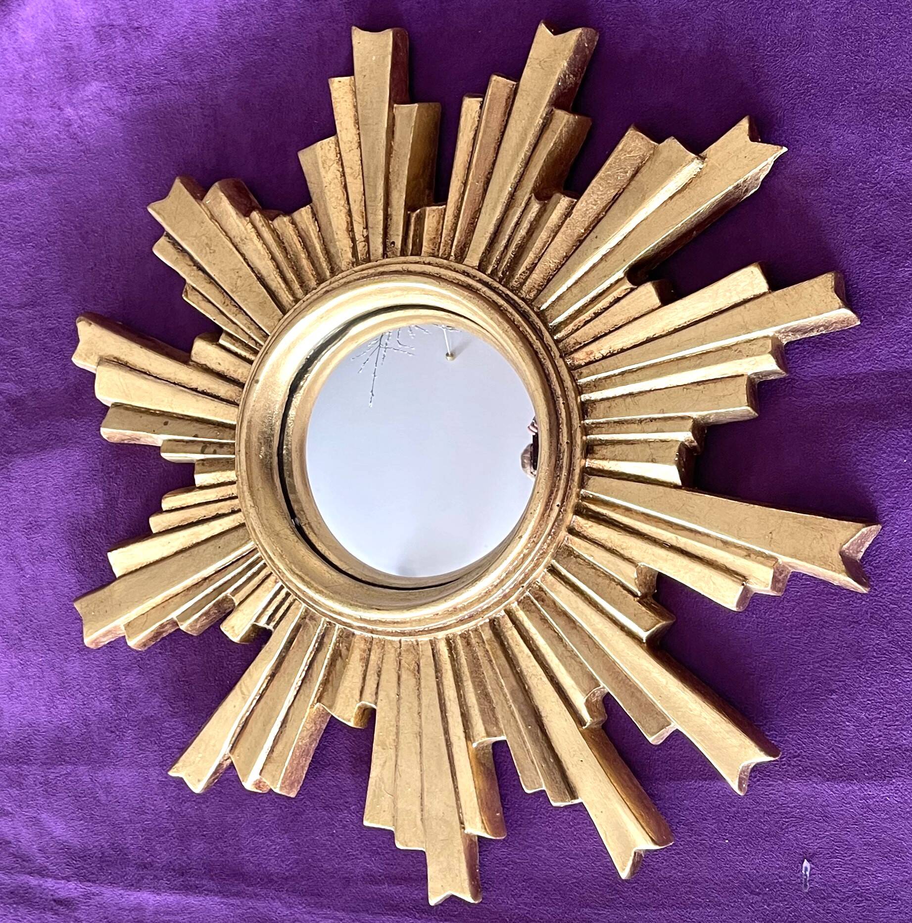 Golden wood “witch’s eye” sun mirror