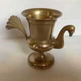 Empty brass bird pocket