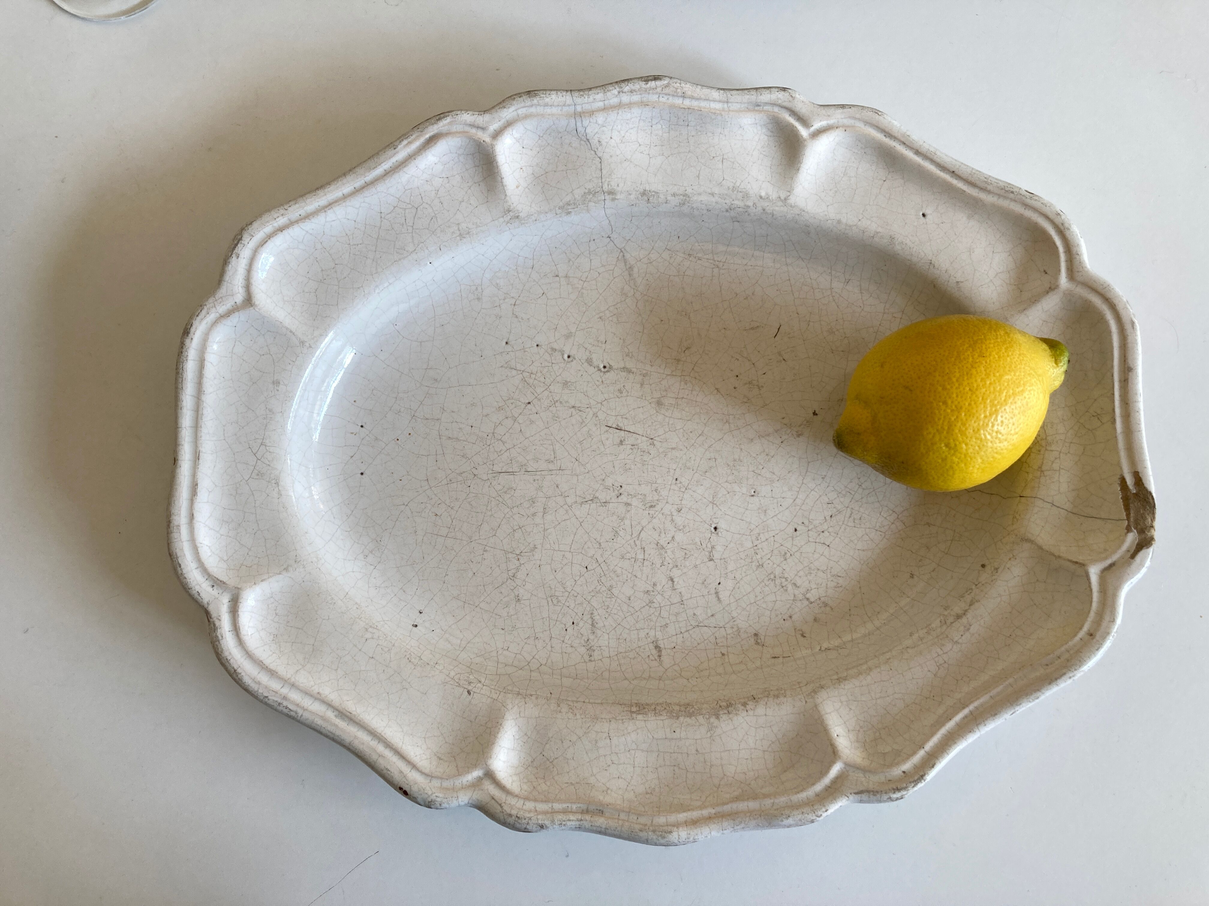 19th-day polished earth dish with godrons