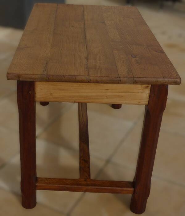 Oak farmhouse table with legs joined by a spacer