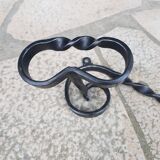 Wrought iron wall coat rack