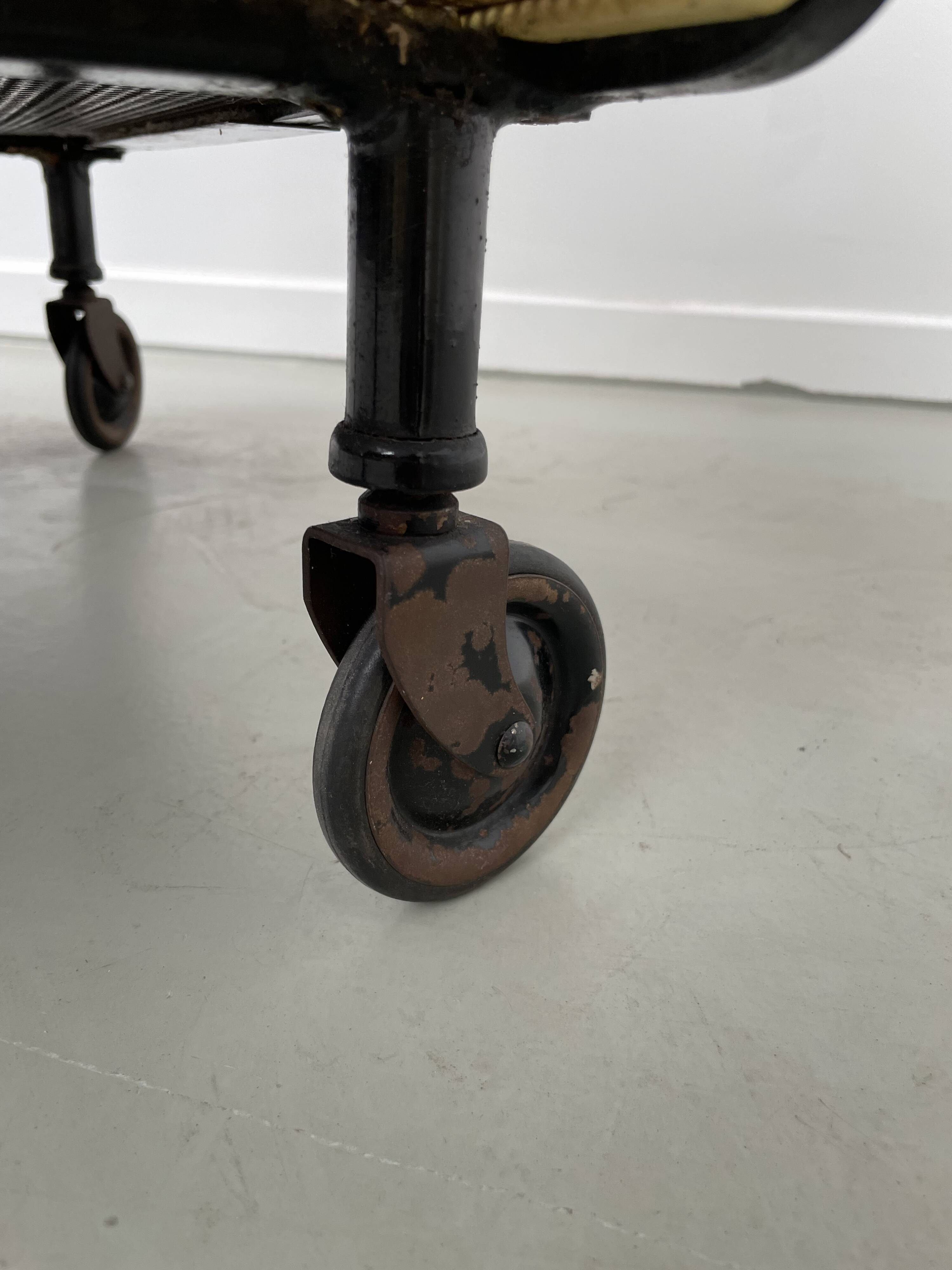 Perforated metal serving trolley in the Mathieu Matégot style