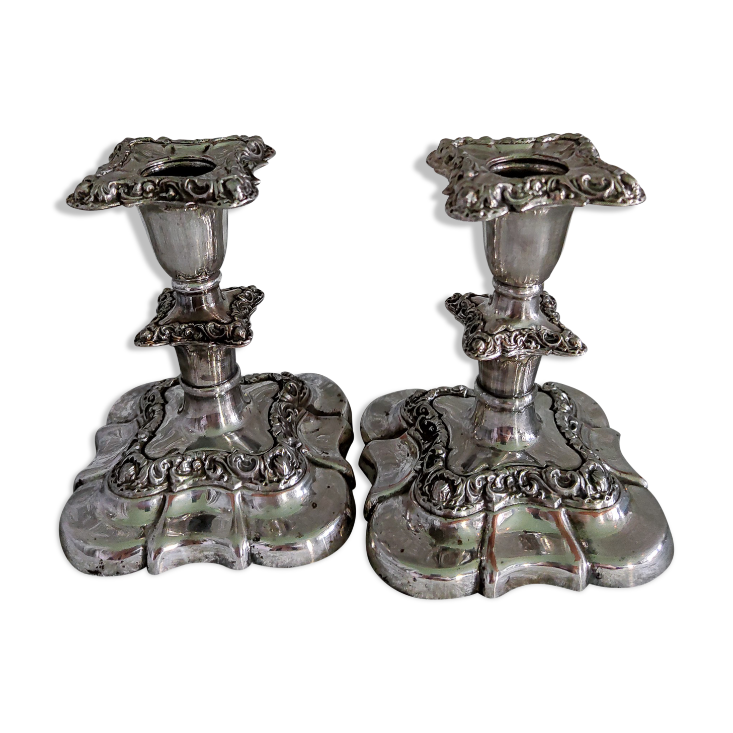 Pair of silver metal candle holders