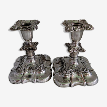 Pair of silver metal candle holders