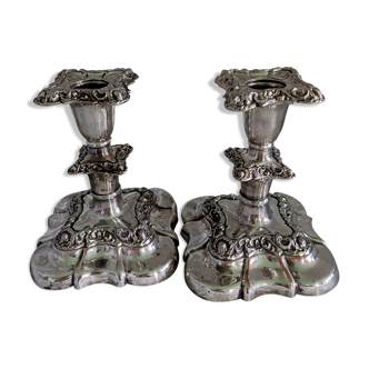 Pair of silver metal candle holders