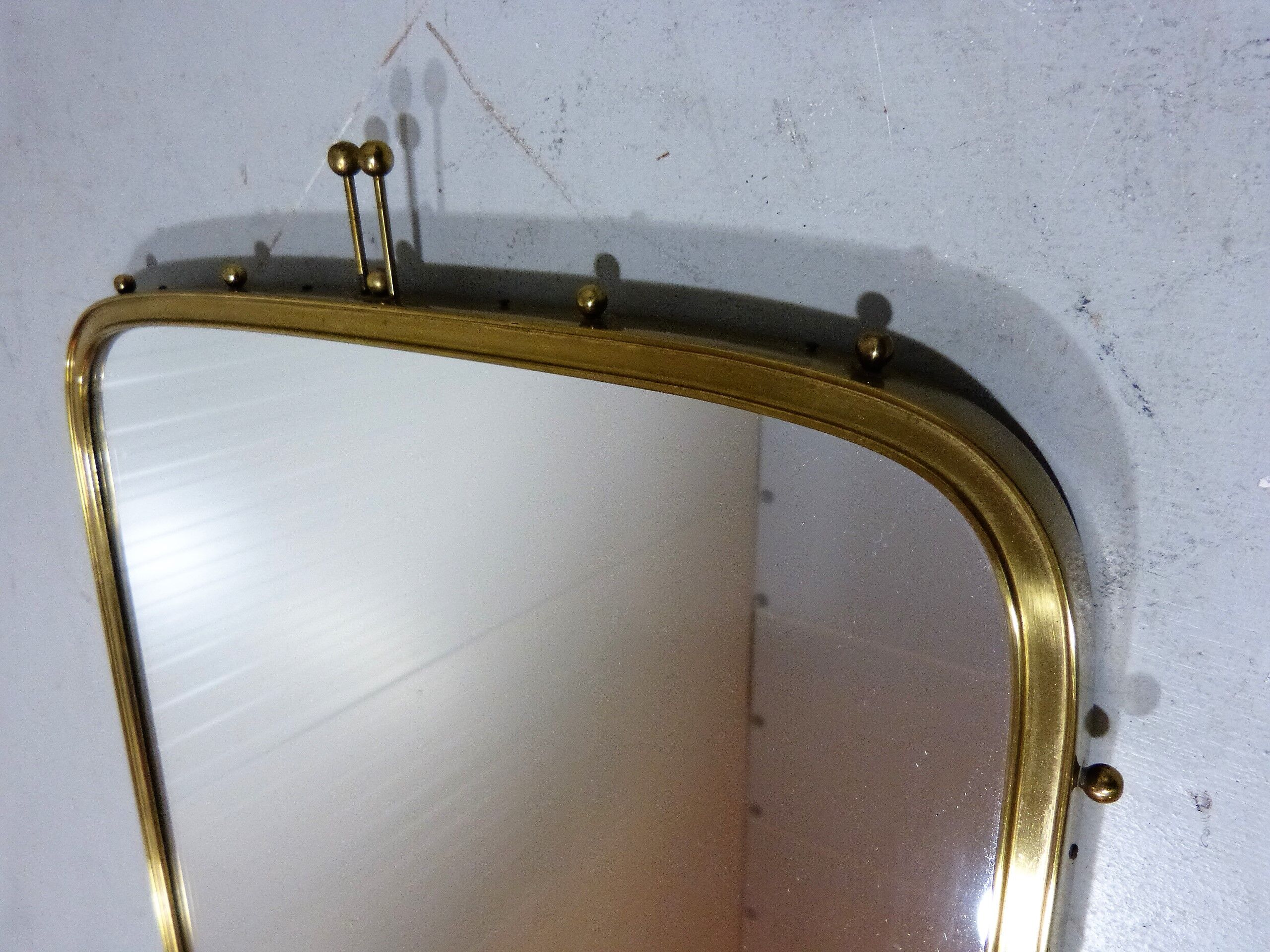 Brass wall mirror by "Münchener Zierspiegel", Germany