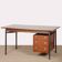 Vintage wooden and metal desk from the 1960s.