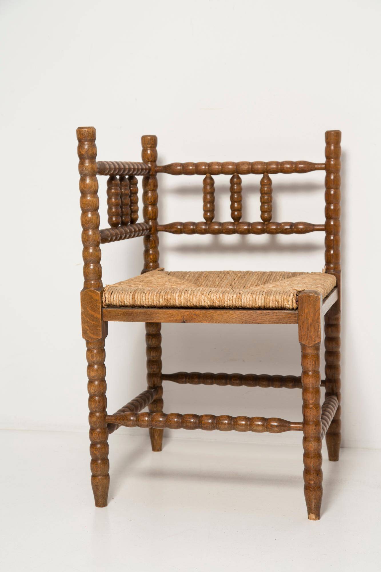 Mid-century provincial antique bobbin corner chair, France, 1940s.