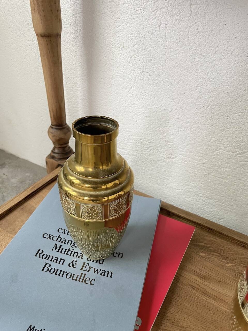 Duo of embossed brass vases