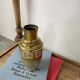 Duo of embossed brass vases