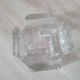 Candle holder or glass warmer with irregular ice effect.