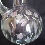 Wine carafe on foot, in cut and enameled glass