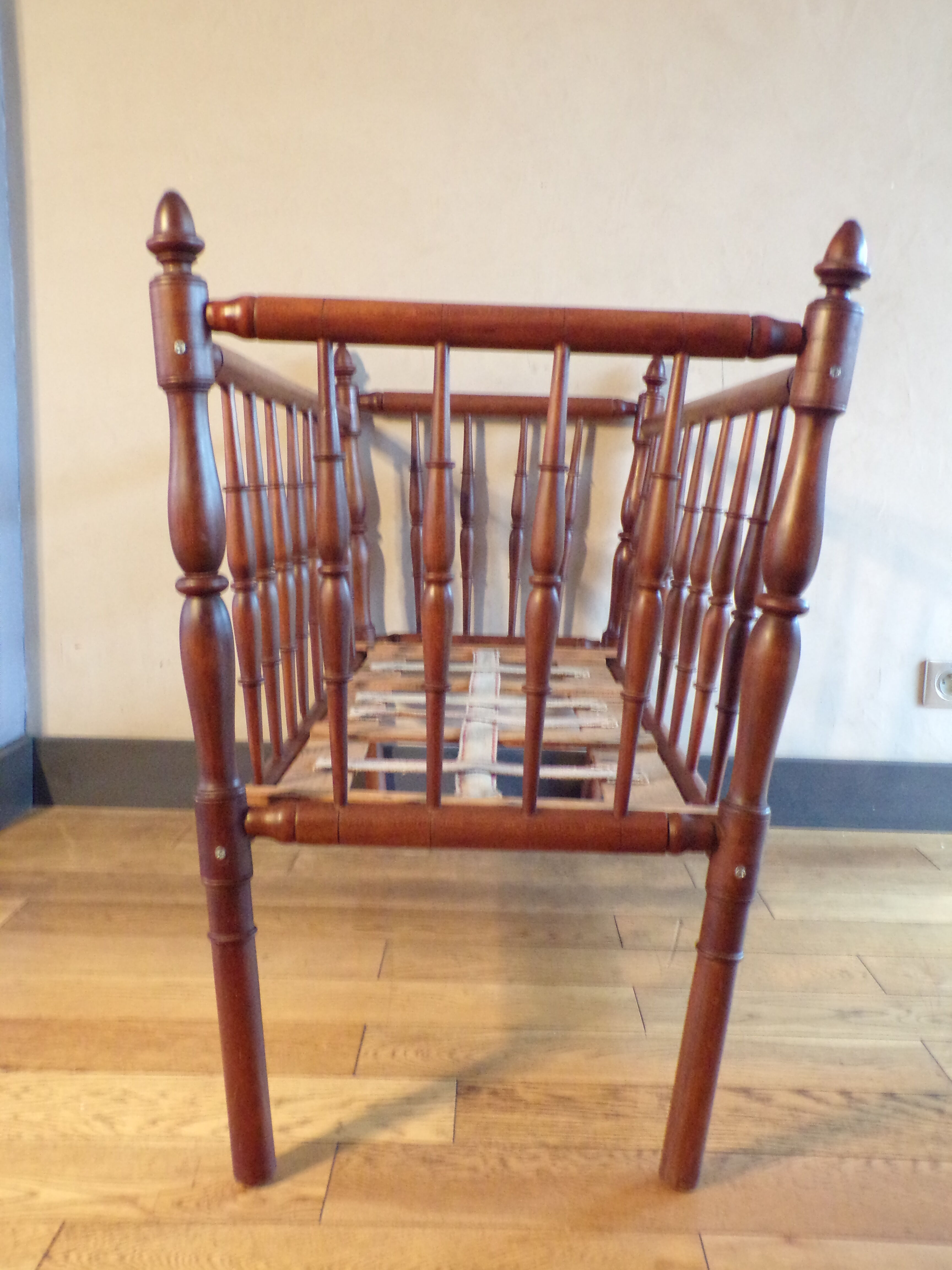 Vintage wooden child bed turned