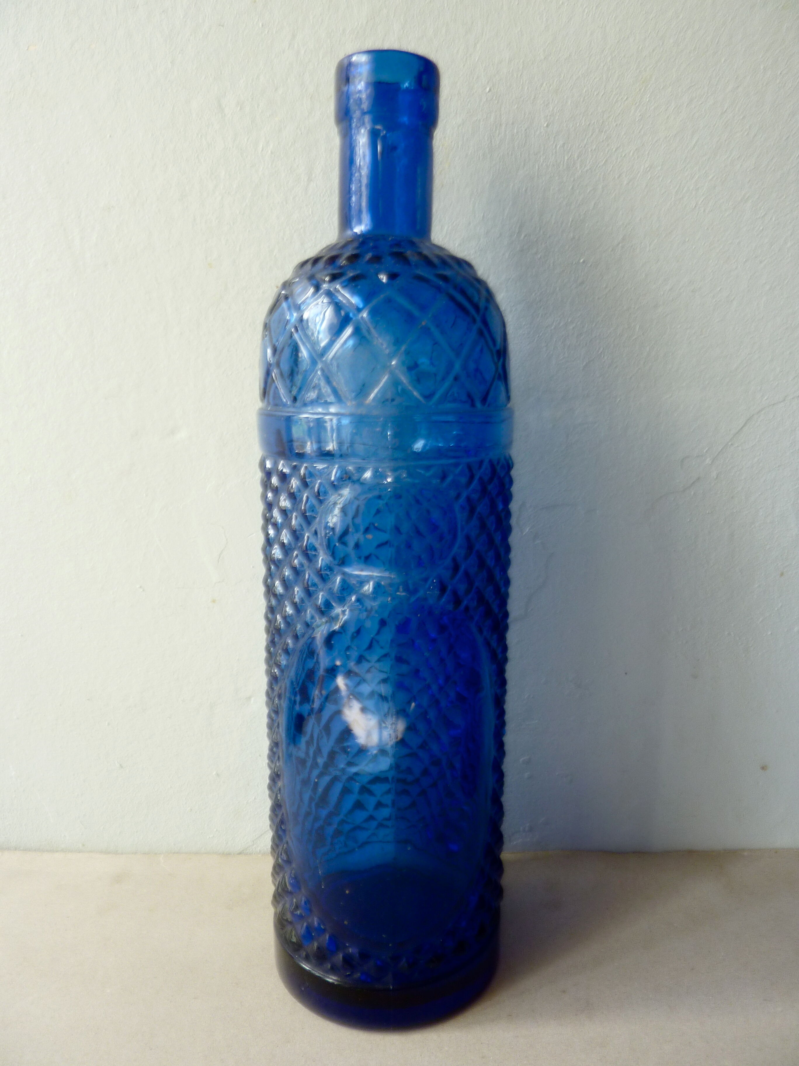 Pair of 2 blue glass bottles
