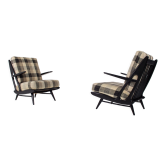 Paire de fauteuils laqués noirs 1950s