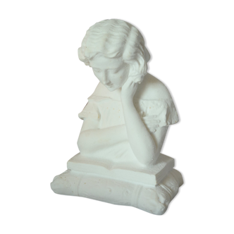 Limestone bust young girl who reads