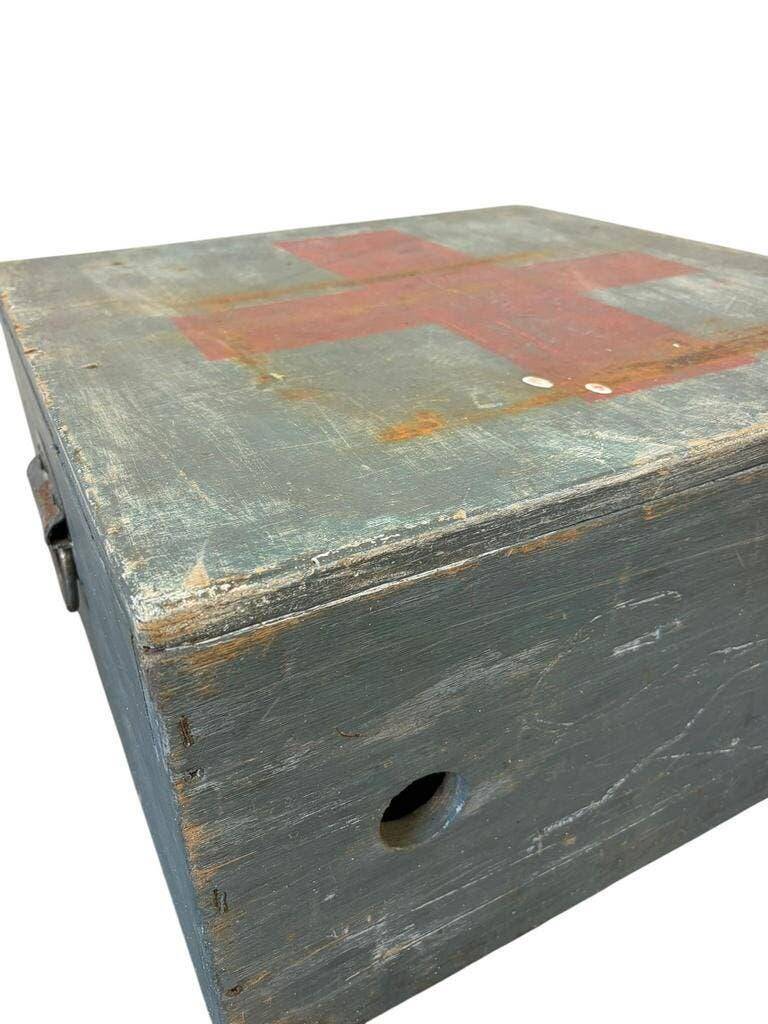 Vintage grey wooden chest with red cross 'first aid'
