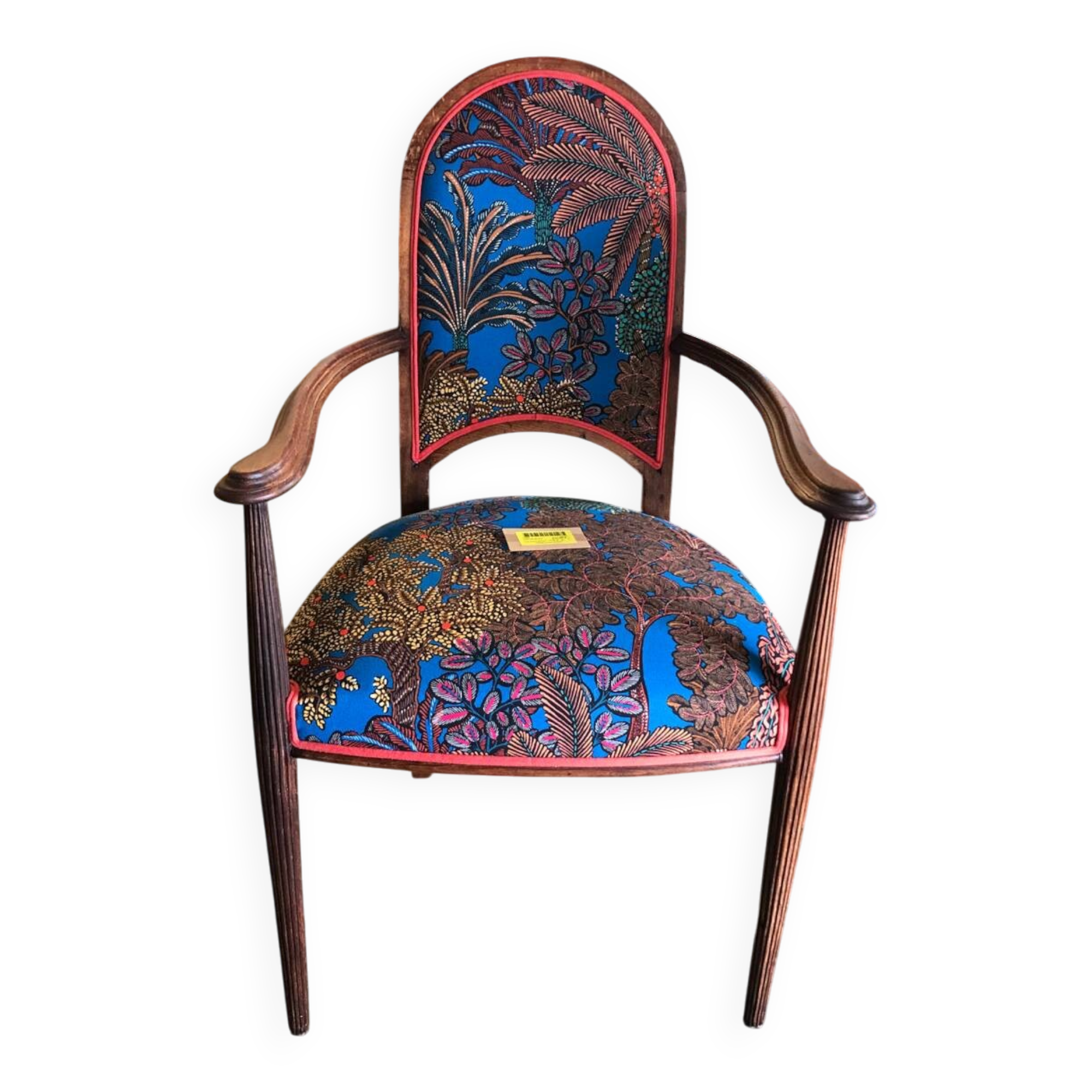 Art Nouveau armchair with a floral seat and backrest.