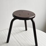 Dark brown metal stool, minimalist three-legged design