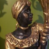 Paire de nubiens porte torchère en bois doré baroque