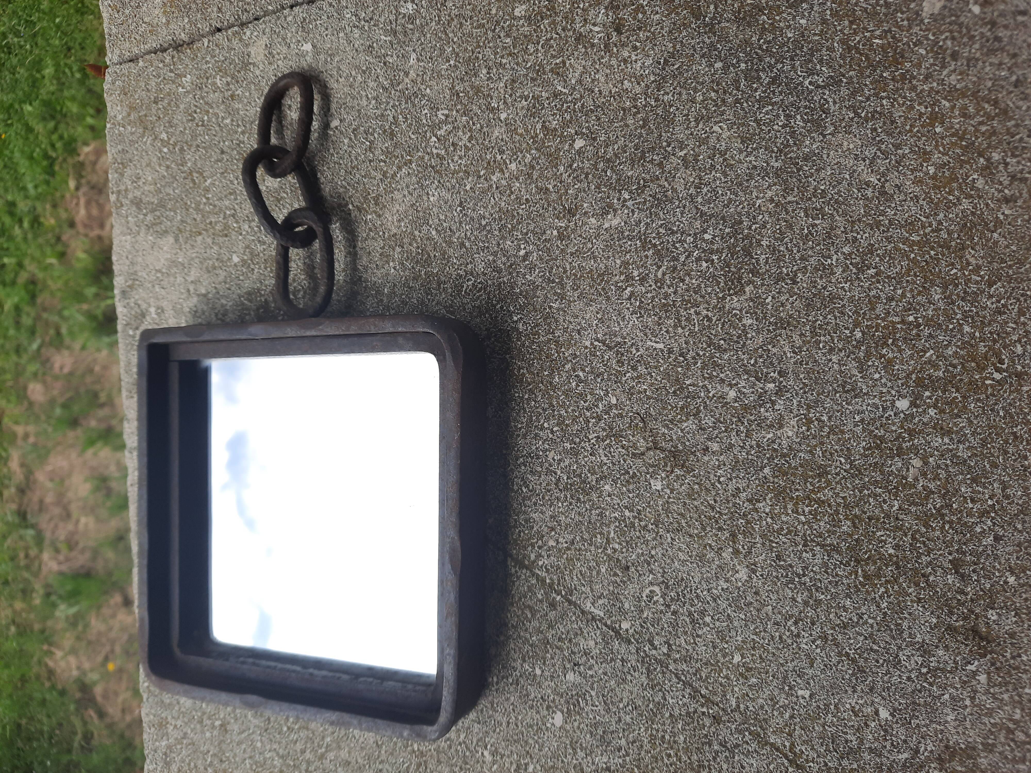 Brutalist cast iron mirror