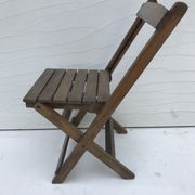 Old folding chair child in wood