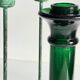 Green glass and metal candle holders