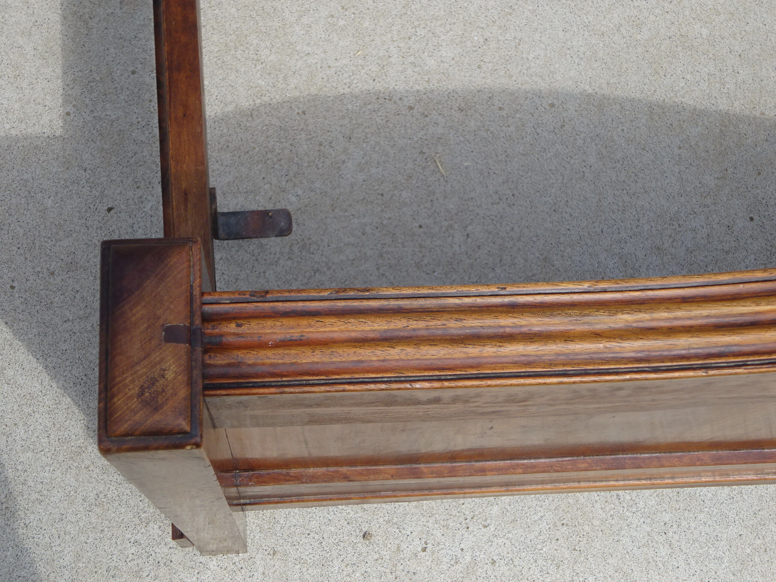 Walnut bed and walnut magnifying glass nineteenth century