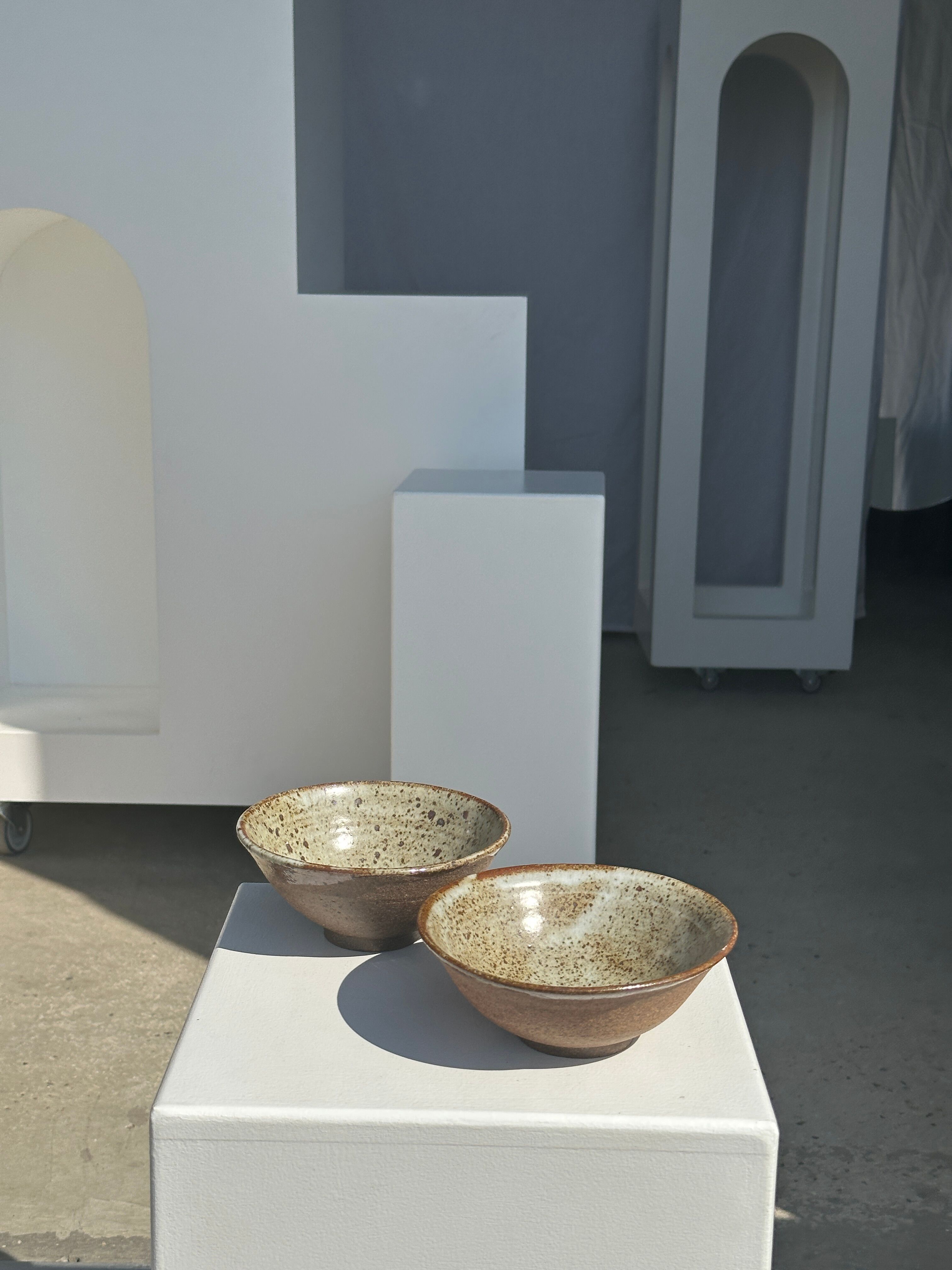 Duo of ceramic bowls interior glazed exterior matt raw earth